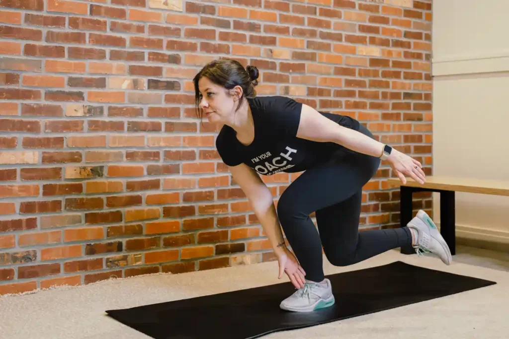 A person exercising their arms at home with light weights Royal Leamington Spa