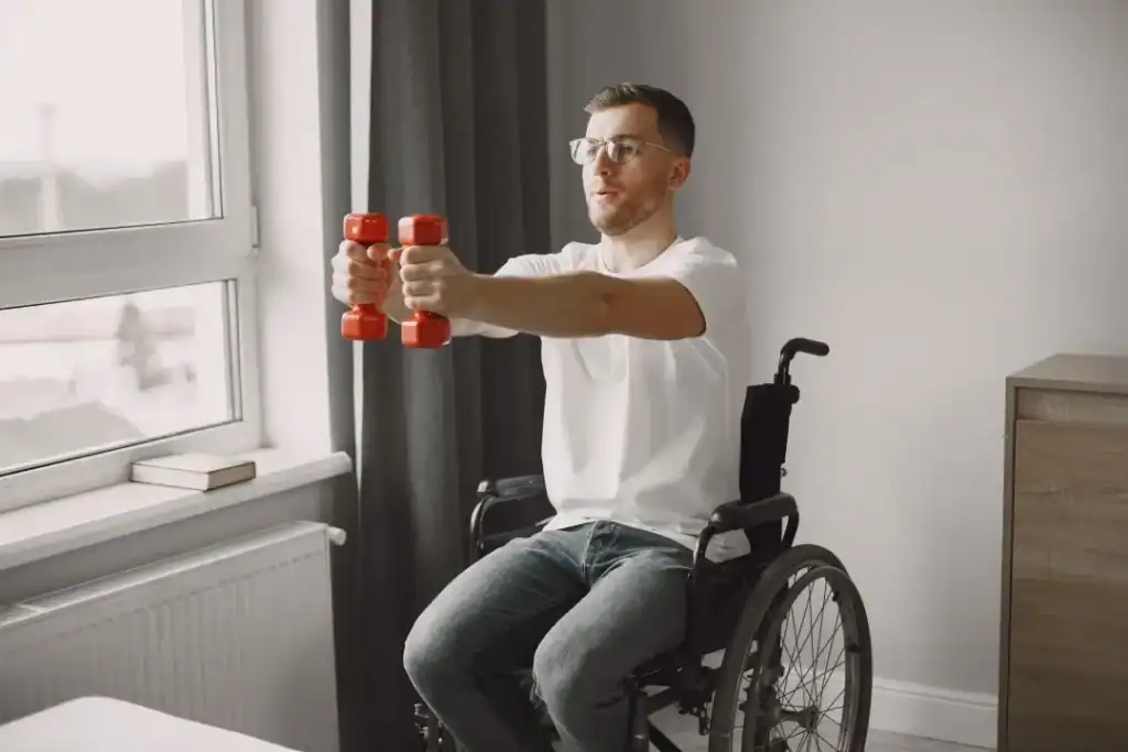 Empowering Weight Loss: A Comprehensive Guide for Individuals with Disabilities 1 Image of man doing exercise in his wheelchair to aid weight loss Royal Leamington Spa