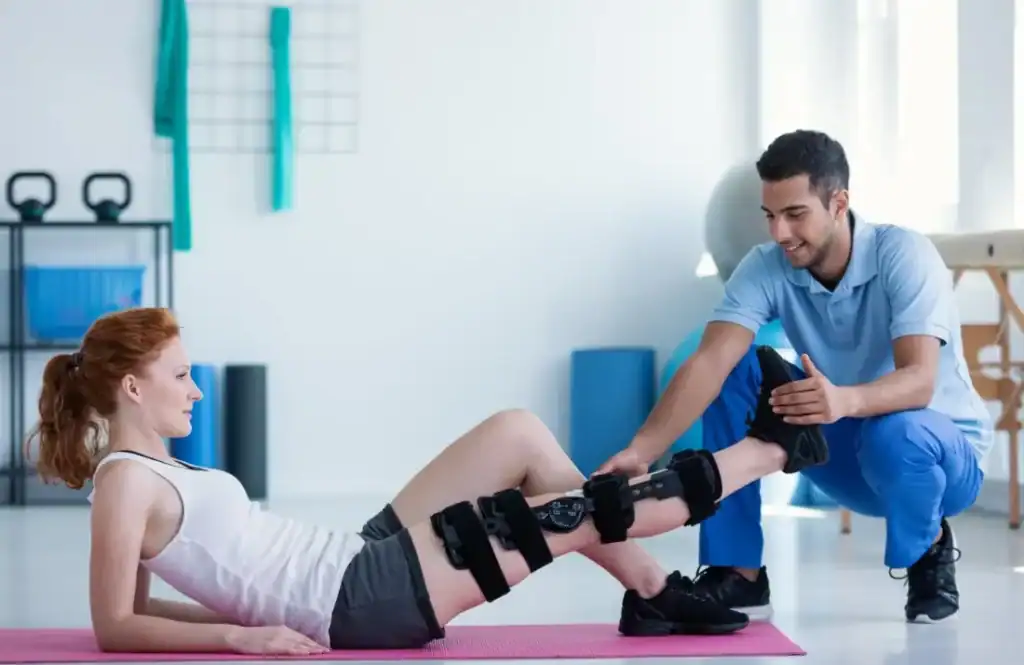 Debunking Meal Timing Myths: The Truth About Muscle Recovery 1 Woman having treatment to help muscle recovery Royal Leamington Spa after an injury