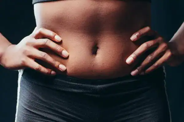 Toning Your Stomach: The Ultimate Guide to Achieving a Sculpted Stomach While Shedding Pounds 1 Image of a toned stomach after non surgical treatment Royal Leamington Spa